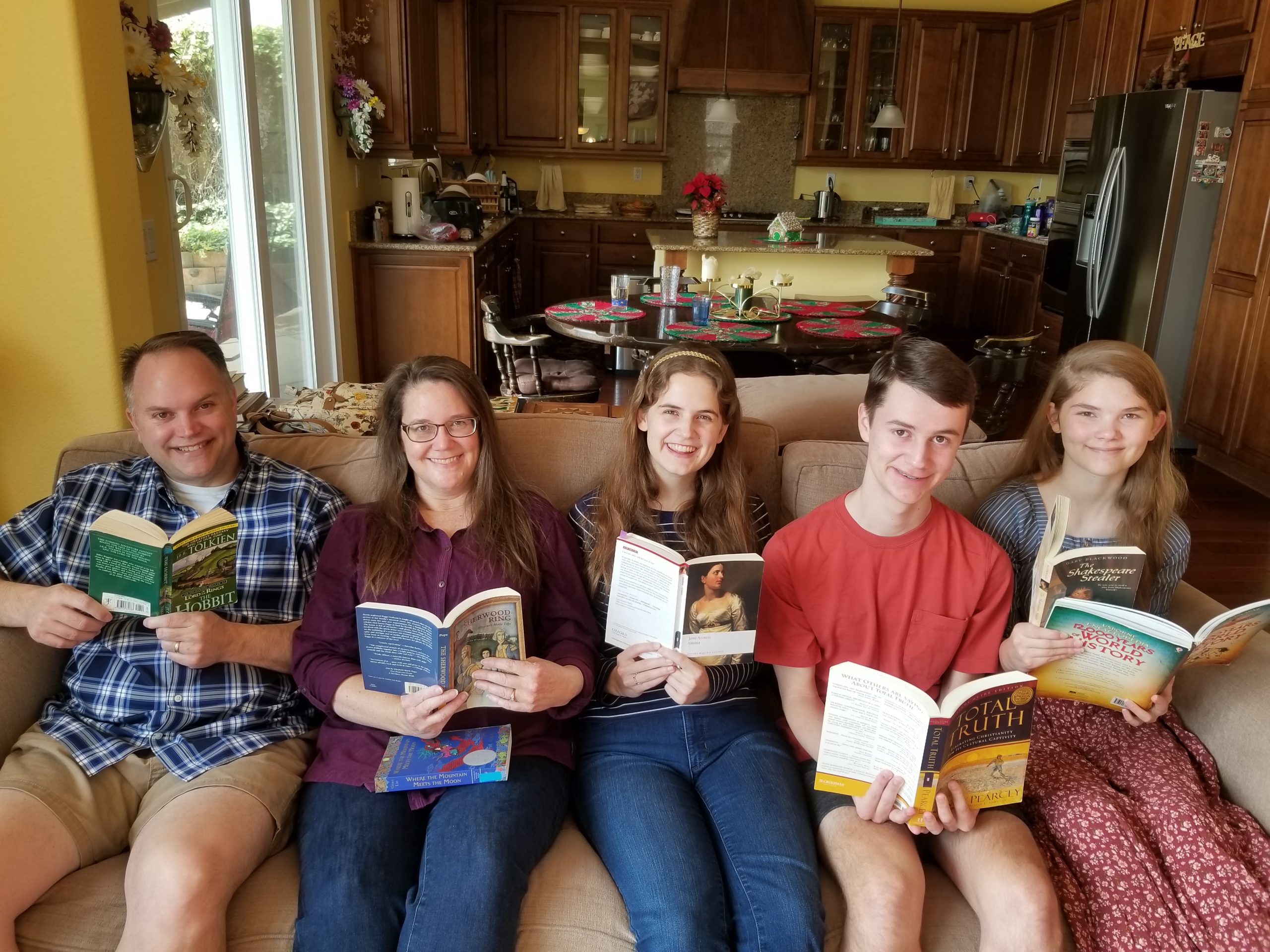 Jensen Family reading on couch